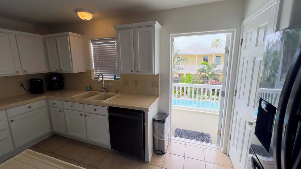 House, Multiple Beds, Pool Access, Partial Ocean View (Tranquil Turquoise Retreat) | Private kitchen | Fridge, microwave, oven, stovetop