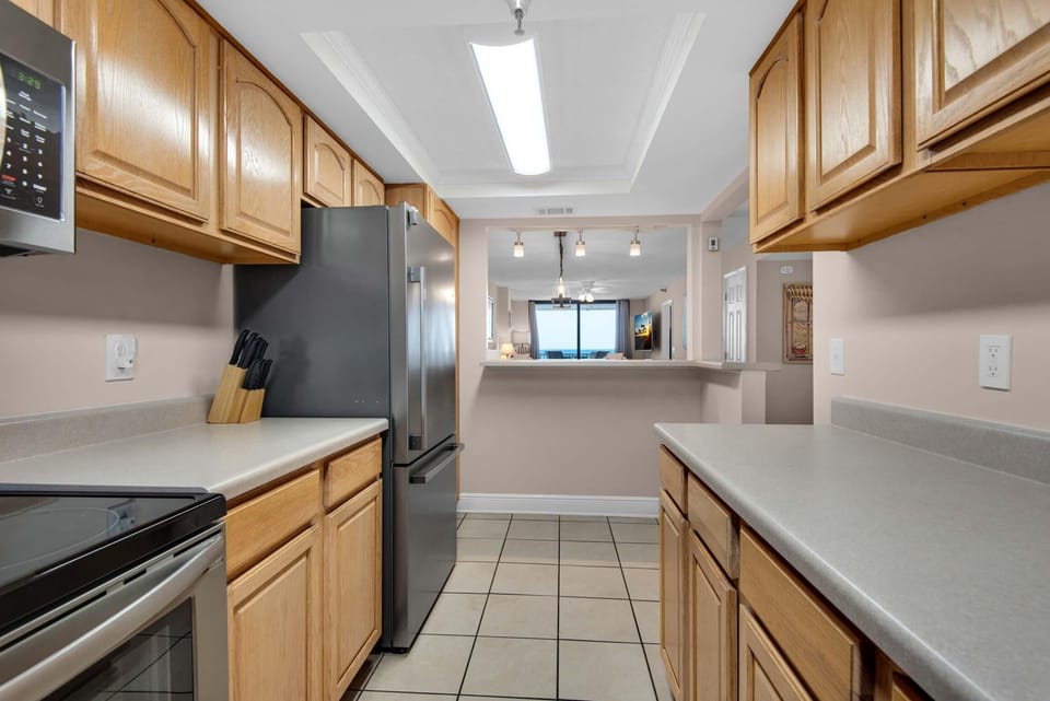 Condo, Multiple Beds (Emerald Surf 106) | Private kitchen | Oven, toaster
