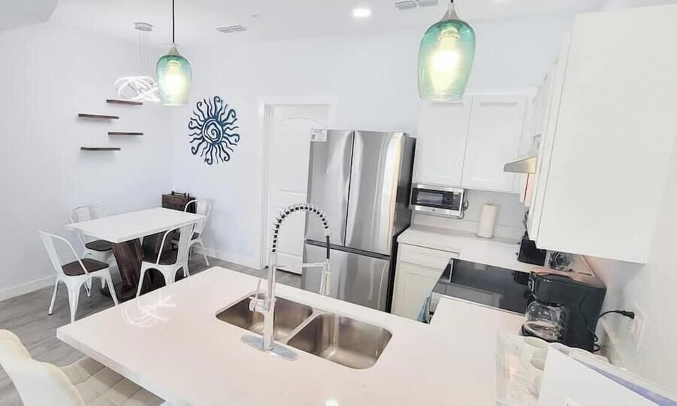 Townhome, Multiple Beds, Kitchen, Garden View (Villas de Laguna 2) | Private kitchen | Fridge, microwave, oven, stovetop