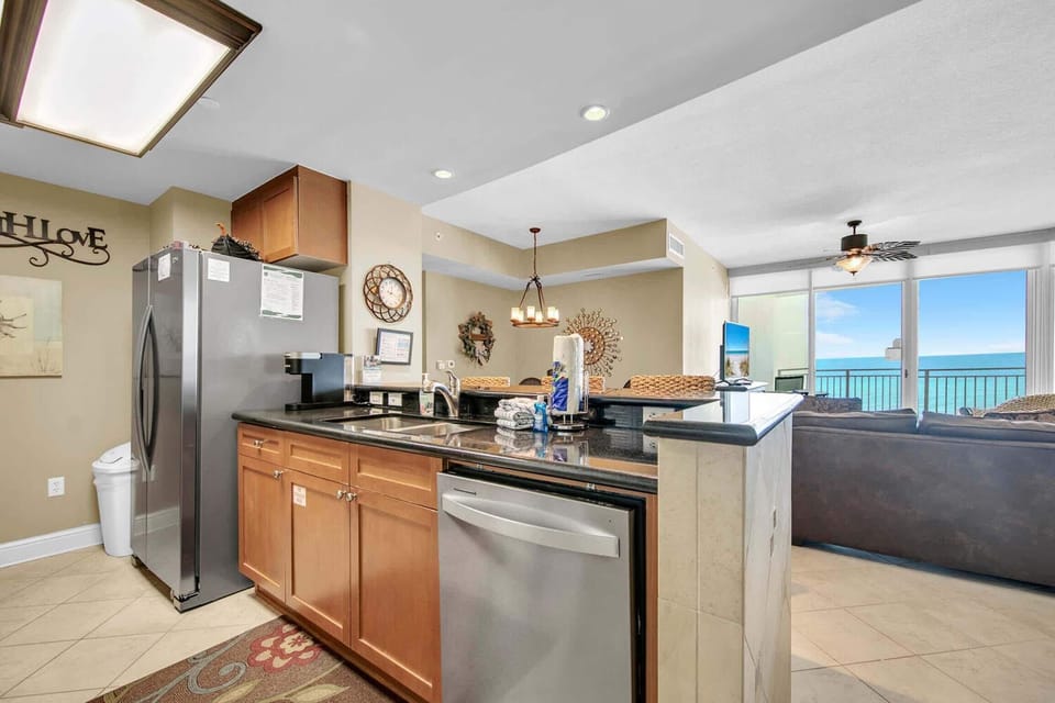 Condo, Multiple Beds (Aqua Resort 711) | Private kitchen | Oven, toaster, cookware/dishes/utensils
