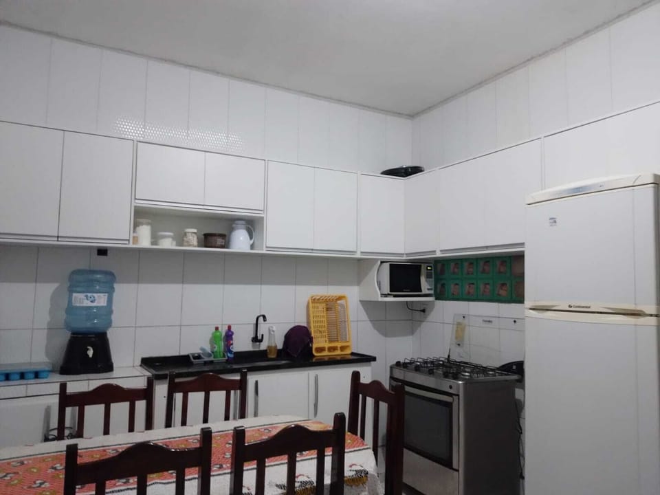 Full-size fridge, microwave, oven, cookware/dishes/utensils