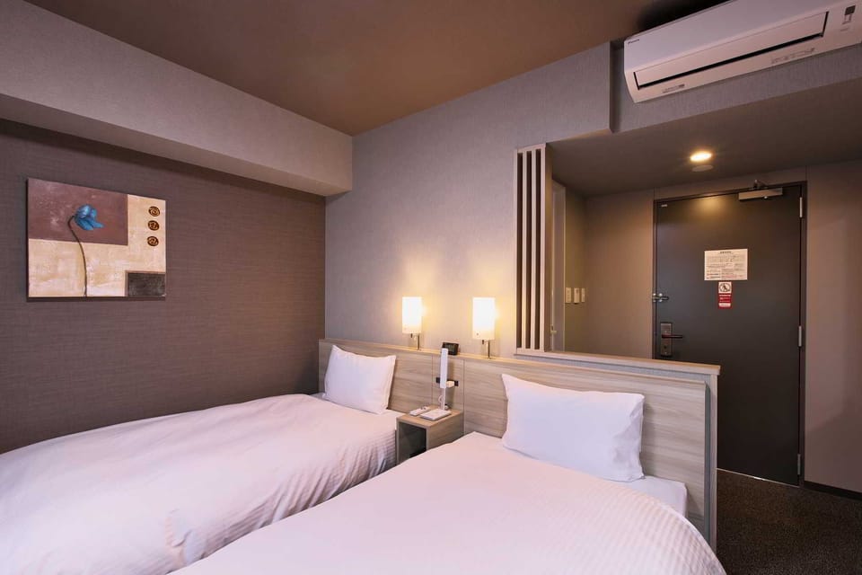 Twin Room, Non Smoking | Desk, laptop workspace, iron/ironing board, WiFi (free)
