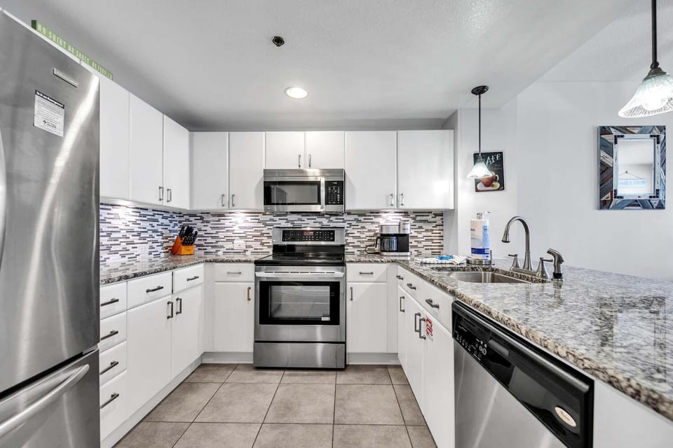 Condo, Multiple Beds (Grand Panama 1-608) | Private kitchen | Oven, cookware/dishes/utensils