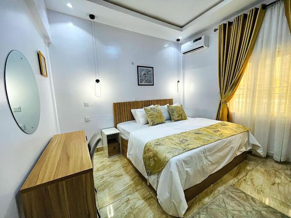 Deluxe Room, Balcony, City View | Desk, laptop workspace, blackout drapes, soundproofing