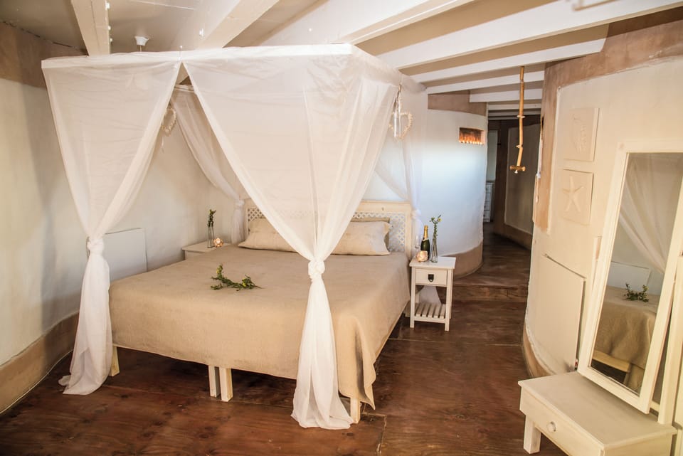 Grand Suite, 1 King Bed, Ocean View | Premium bedding, in-room safe, individually furnished, desk