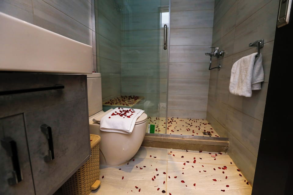 Deluxe Double Room, Balcony, Mountain View | Bathroom | Free toiletries, hair dryer, slippers, towels