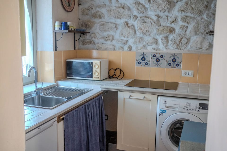Apartment | Private kitchen | Full-size fridge, microwave, oven, stovetop