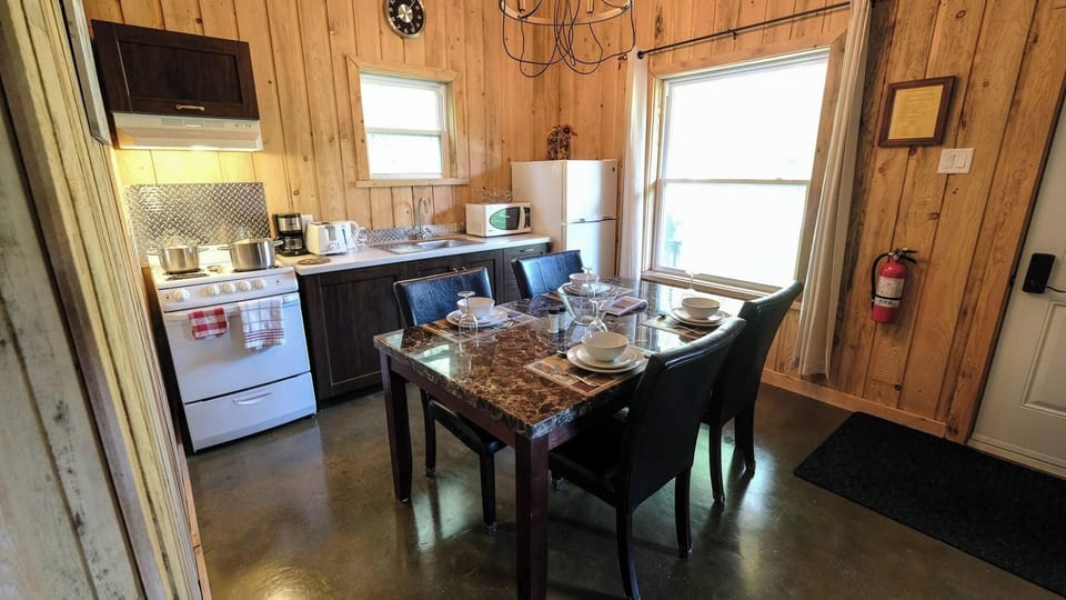 Chalet, 2 Bedrooms | Private kitchen | Electric kettle, toaster, highchair
