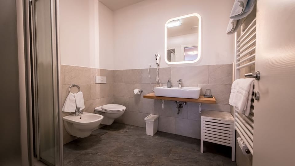 Deluxe Double Room, City View | Bathroom | Shower, hair dryer, towels, soap