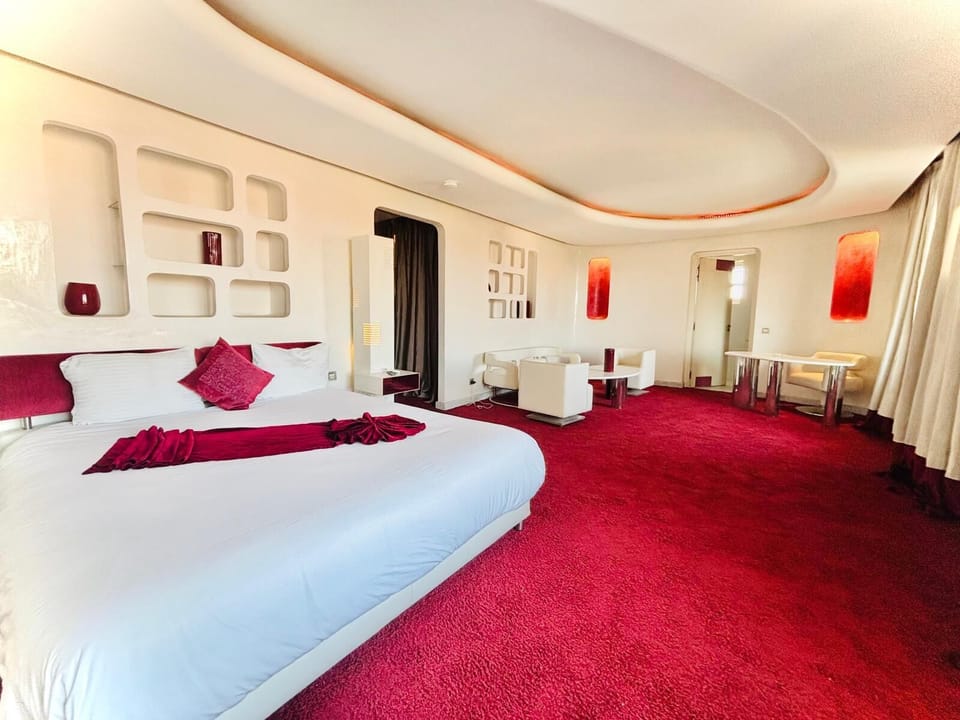 Deluxe Suite, Balcony, City View | In-room safe, desk, laptop workspace, free WiFi