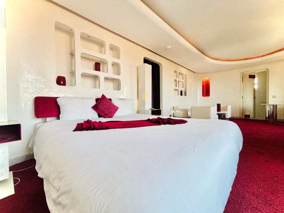 Deluxe Suite, Balcony, City View | In-room safe, desk, laptop workspace, free WiFi