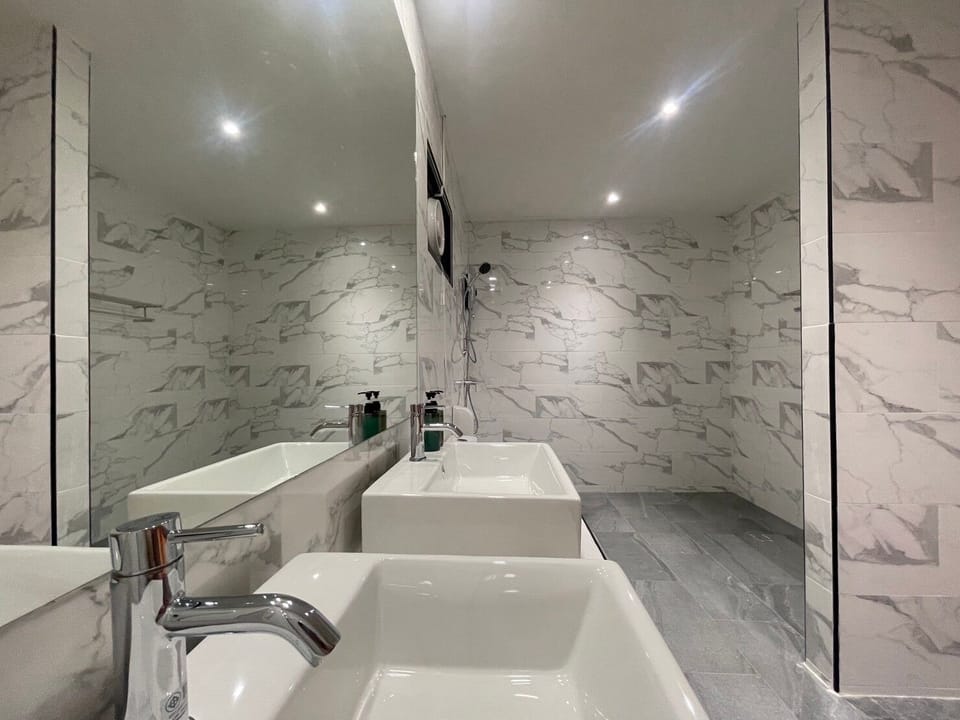 Family Triple Room, City View | Bathroom | Shower, hair dryer, towels, soap