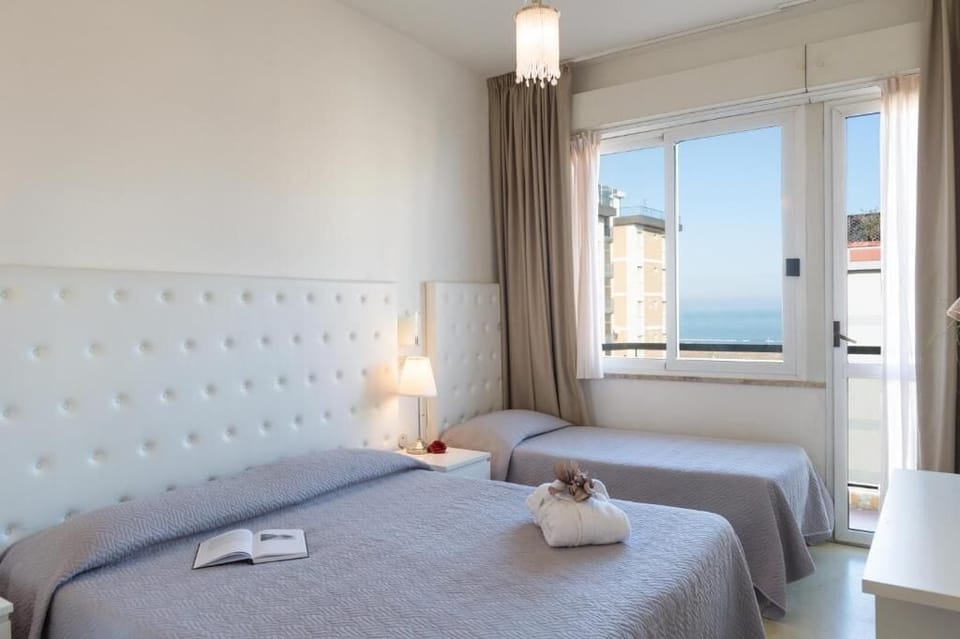 Quadruple Room, Balcony, Sea View | In-room safe, desk, soundproofing, free WiFi
