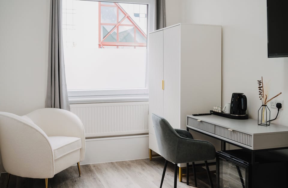 Deluxe Twin Room, 2 Bedrooms | In-room safe, desk, laptop workspace, soundproofing
