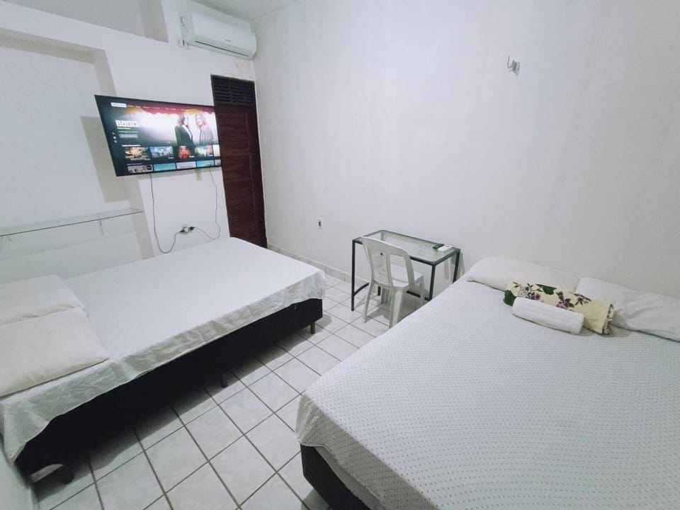Basic Quadruple Room, Air conditioning | Minibar, desk, laptop workspace, free WiFi