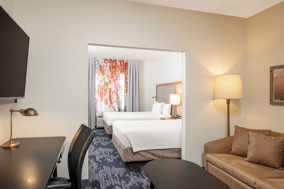 Down comforters, desk, laptop workspace, blackout drapes