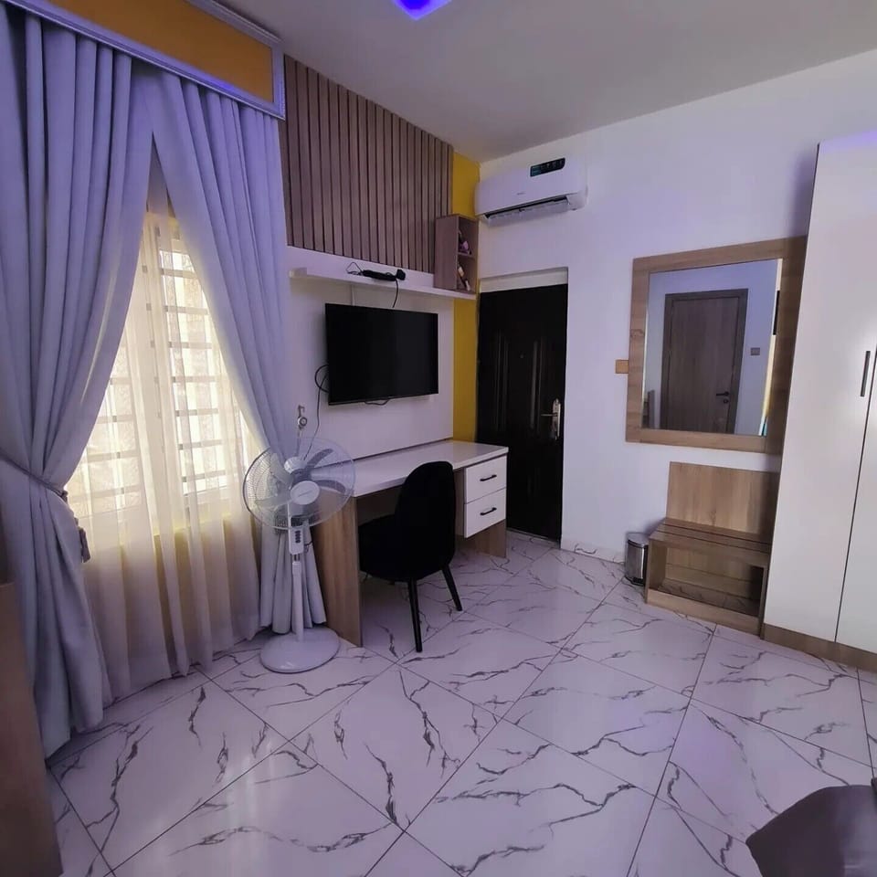 Family Apartment, Balcony, City View | 1 bedroom, desk, laptop workspace, blackout drapes