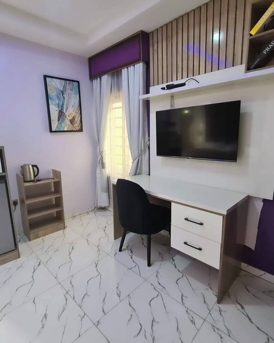 Family Apartment, Balcony, City View | 1 bedroom, desk, laptop workspace, blackout drapes