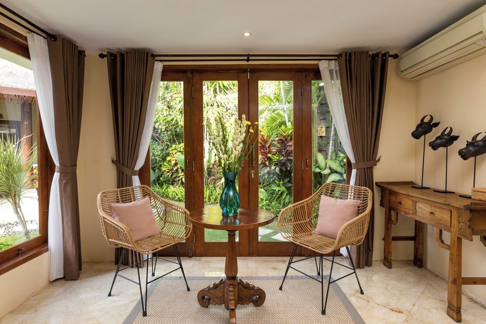 Deluxe Villa, Garden View | Living area | Flat-screen TV