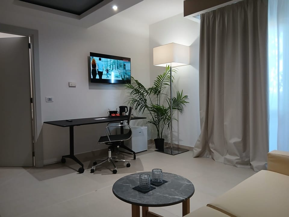 Junior Suite | Living area | 32-inch TV with digital channels
