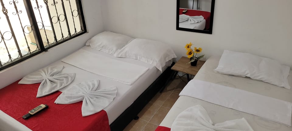 Comfort Triple Room, Courtyard View | WiFi (free), bed sheets