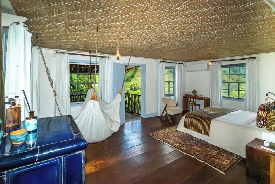 Deluxe Suite, Garden View | Iron/ironing board, free WiFi
