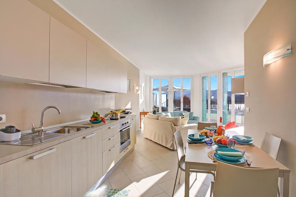 Family Apartment, 2 Bedrooms, Balcony, Lakeside (Sogno Sul Lago, Lakefront Balcony) | Private kitchen | Dining table