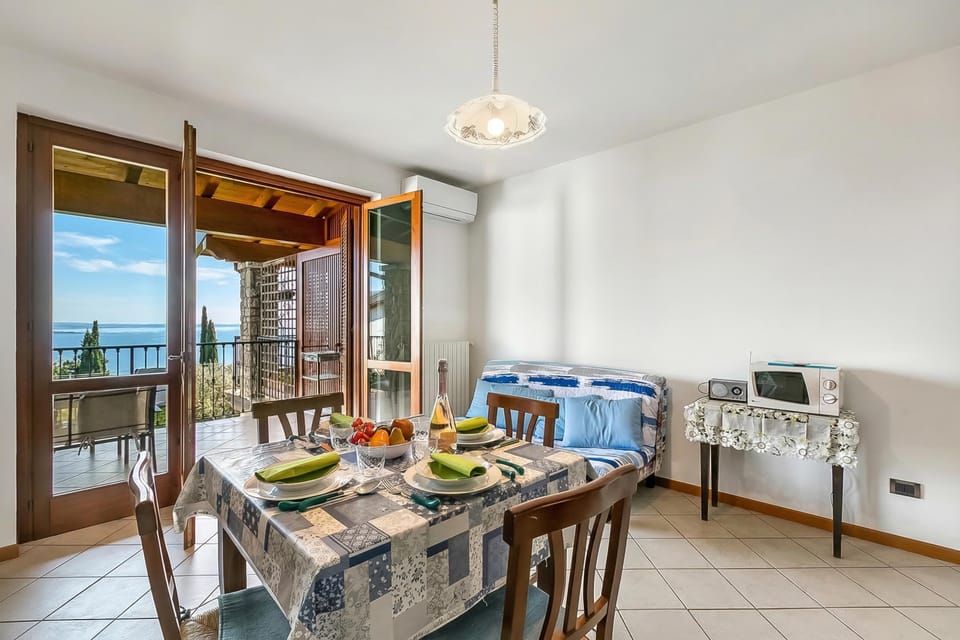 Standard Apartment, 2 Bedrooms, Balcony, Mountainside (Julia's House lakeview & shared pool) | Dining