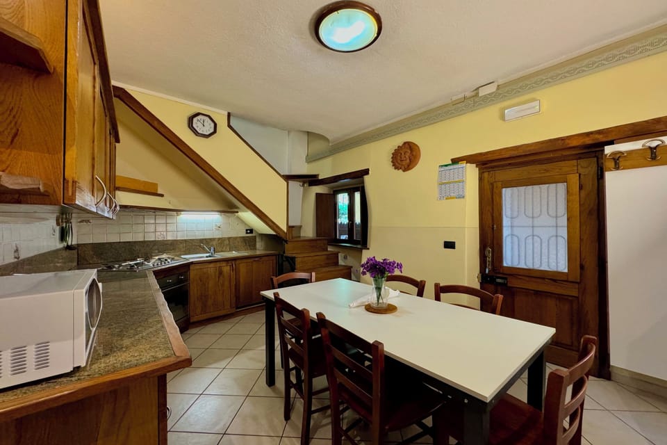 Family Townhome, Multiple Bedrooms (Borgo di Porlezza) | Private kitchen | Fridge, microwave, stovetop, coffee/tea maker