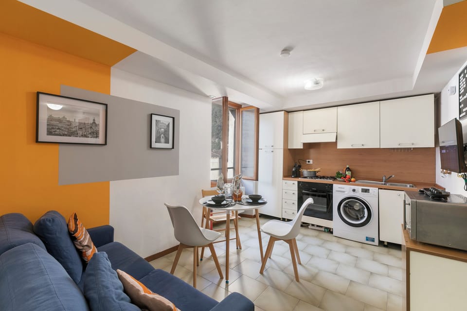 Family Apartment, Multiple Bedrooms (The Harbor Old House) | Living area | 21-inch Smart TV with cable channels