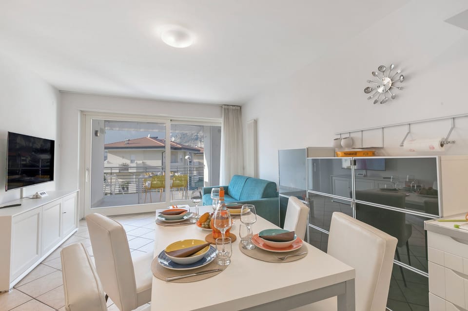 Family Apartment, 2 Bedrooms, Balcony (Torbolino - Apt with Balcony. Pool &) | Dining