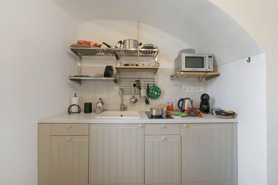 Family Apartment, Multiple Bedrooms (La Torretta Holiday Home Sanremo) | Private kitchen | Fridge, microwave, stovetop, coffee/tea maker