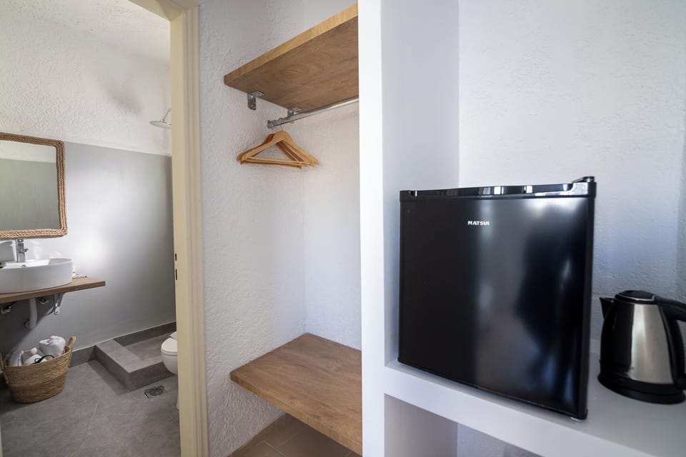 Double Room, Courtyard View | Bathroom | Shower, hair dryer, slippers, towels
