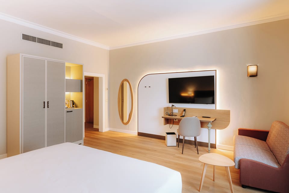 Superior Room, Multiple Beds | Minibar, in-room safe, desk, laptop workspace