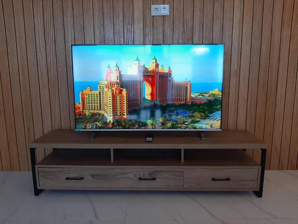 Family Apartment, River View | Television