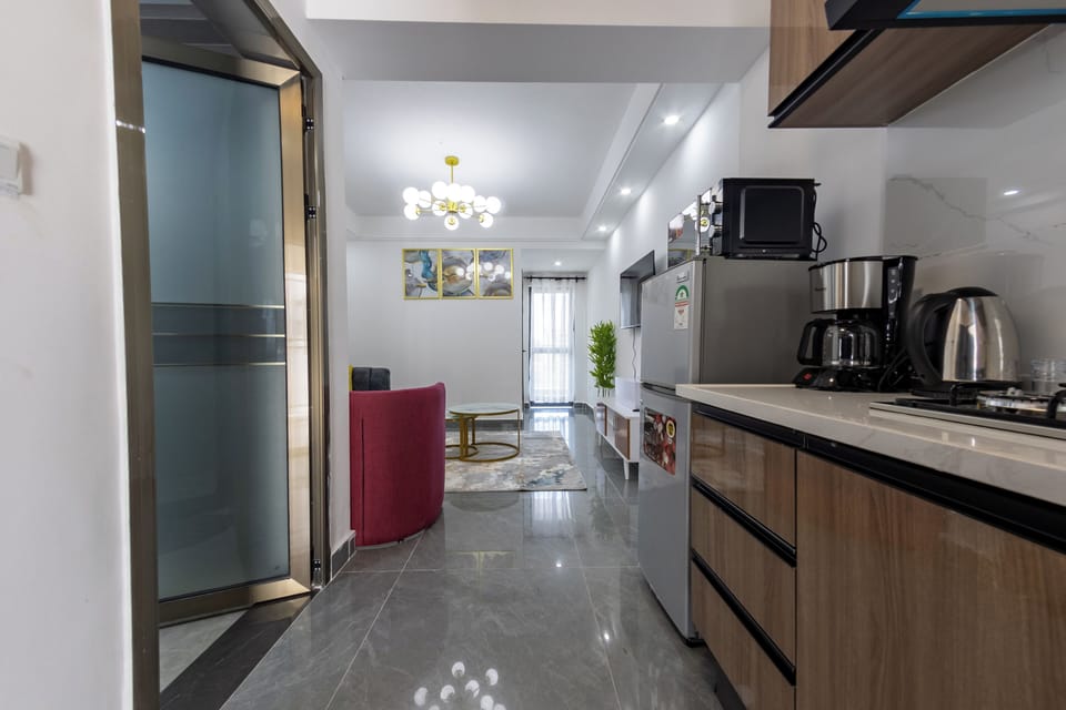 Deluxe Apartment, River View | Private kitchen | Electric kettle