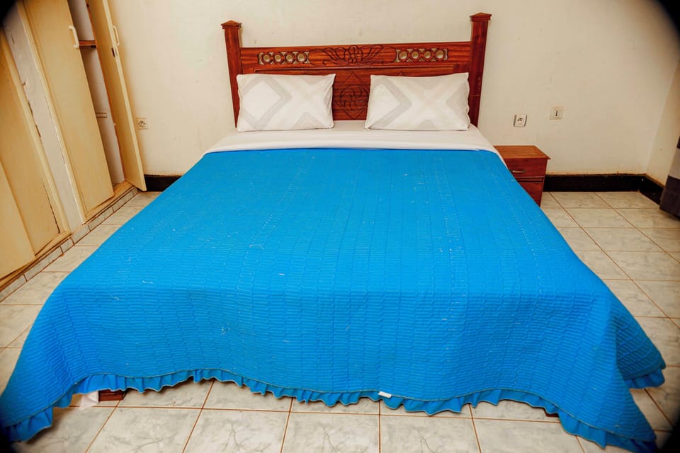 Family Room, Balcony, City View | Iron/ironing board, WiFi (free)