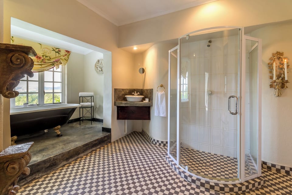 Separate tub and shower, deep soaking tub, hair dryer, bathrobes