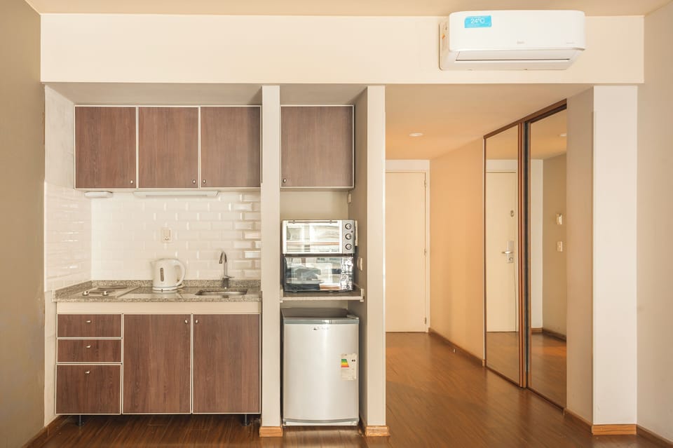 Classic Apartment, Balcony, City View | Private kitchen | Microwave, oven, stovetop, coffee/tea maker