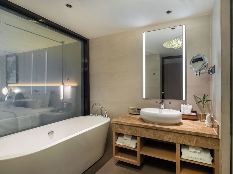 Romantic Double Room, City View | Bathroom | Shower, hair dryer, slippers, towels
