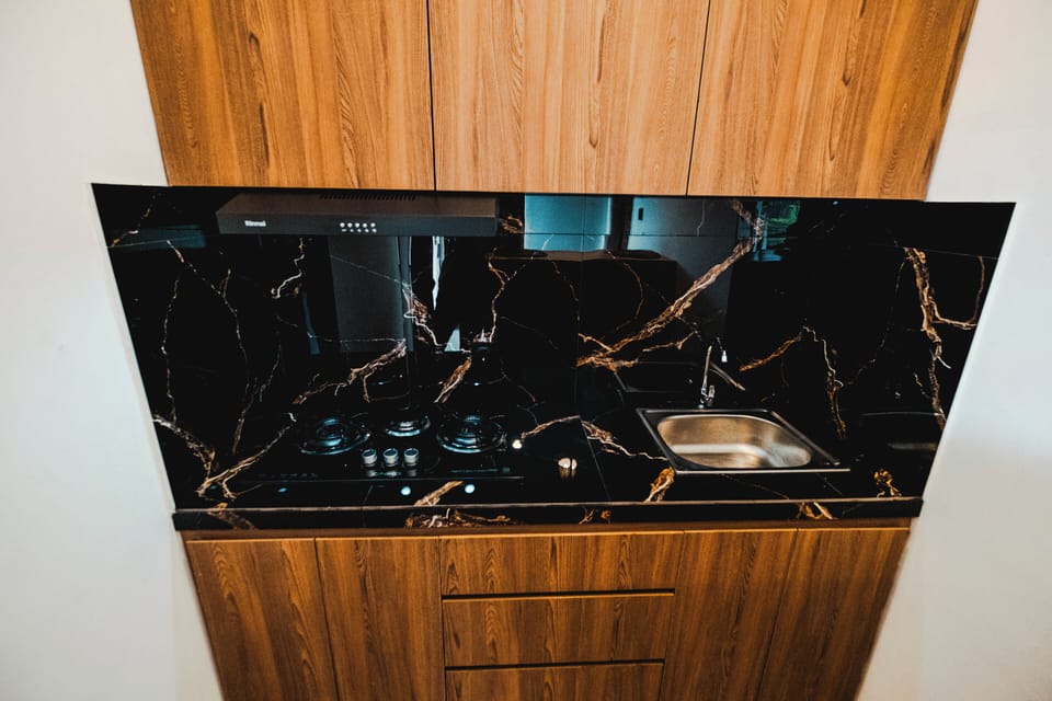 Superior Room | Private kitchen | Coffee/tea maker, mini-fridge, dishwasher, electric kettle
