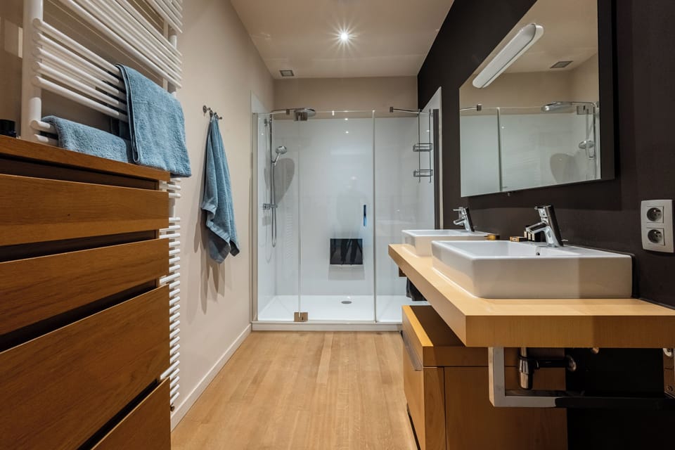 Deluxe Quadruple Room | Bathroom | Bathrobes, slippers