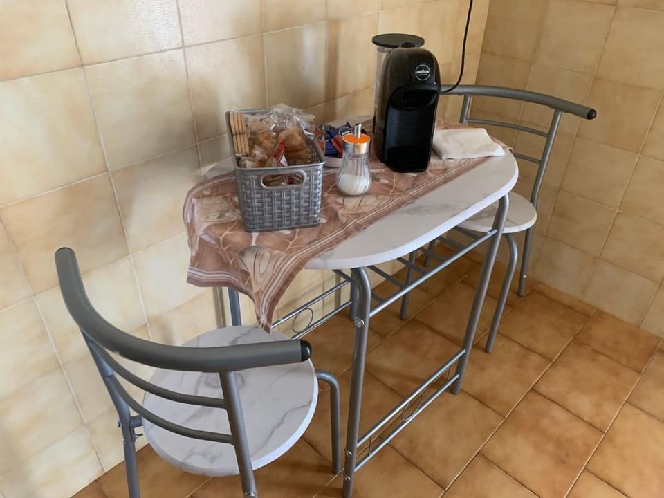 Deluxe Condo, City View | Private kitchen | Microwave, oven, stovetop, espresso maker