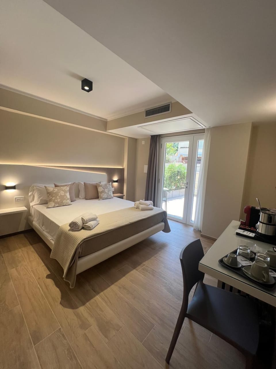 Comfort Room, Patio, Courtyard View | In-room safe, desk, blackout drapes, free WiFi