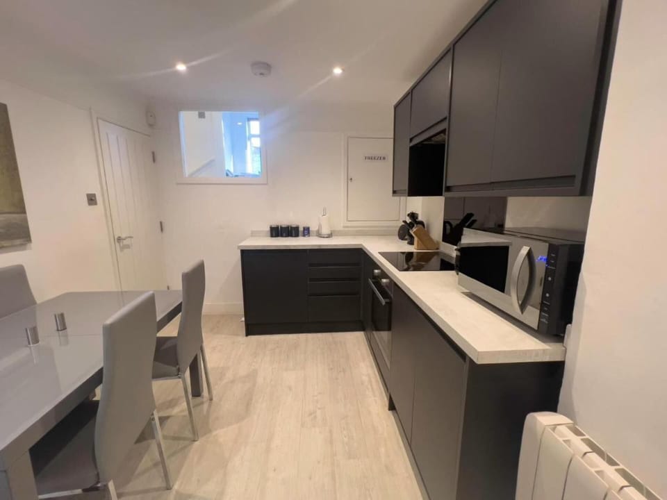 Apartment | Private kitchen | Fridge, microwave, oven, stovetop