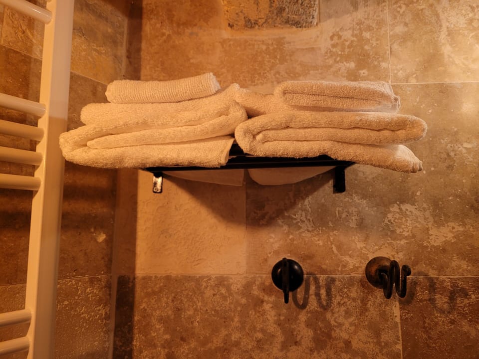STONE ROOM 103 | Bathroom | Free toiletries, hair dryer, bathrobes, slippers