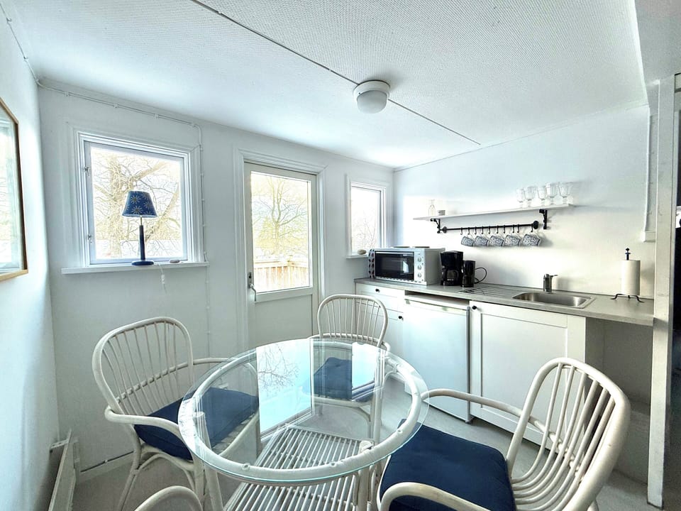 Standard Apartment, 2 Bedrooms, Garden View | Private kitchen | Shared fridge, microwave