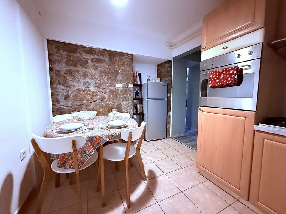 Apartment, Patio, Garden View | Private kitchen | Full-size fridge, oven, stovetop, dishwasher