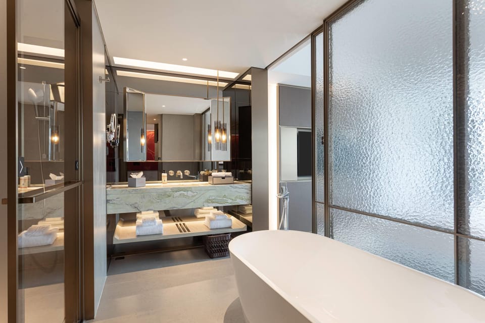 Executive Suite, 1 King Bed, Non Smoking | Bathroom | Slippers