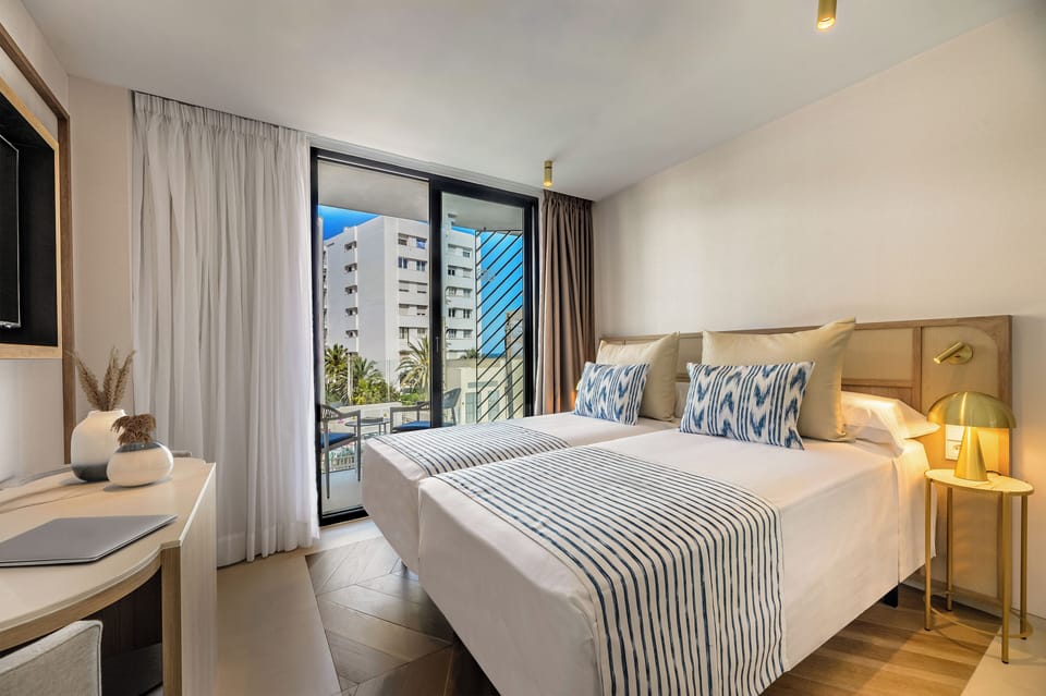 Twin Room, Pool View | In-room safe, desk, iron/ironing board (on request), WiFi (free)